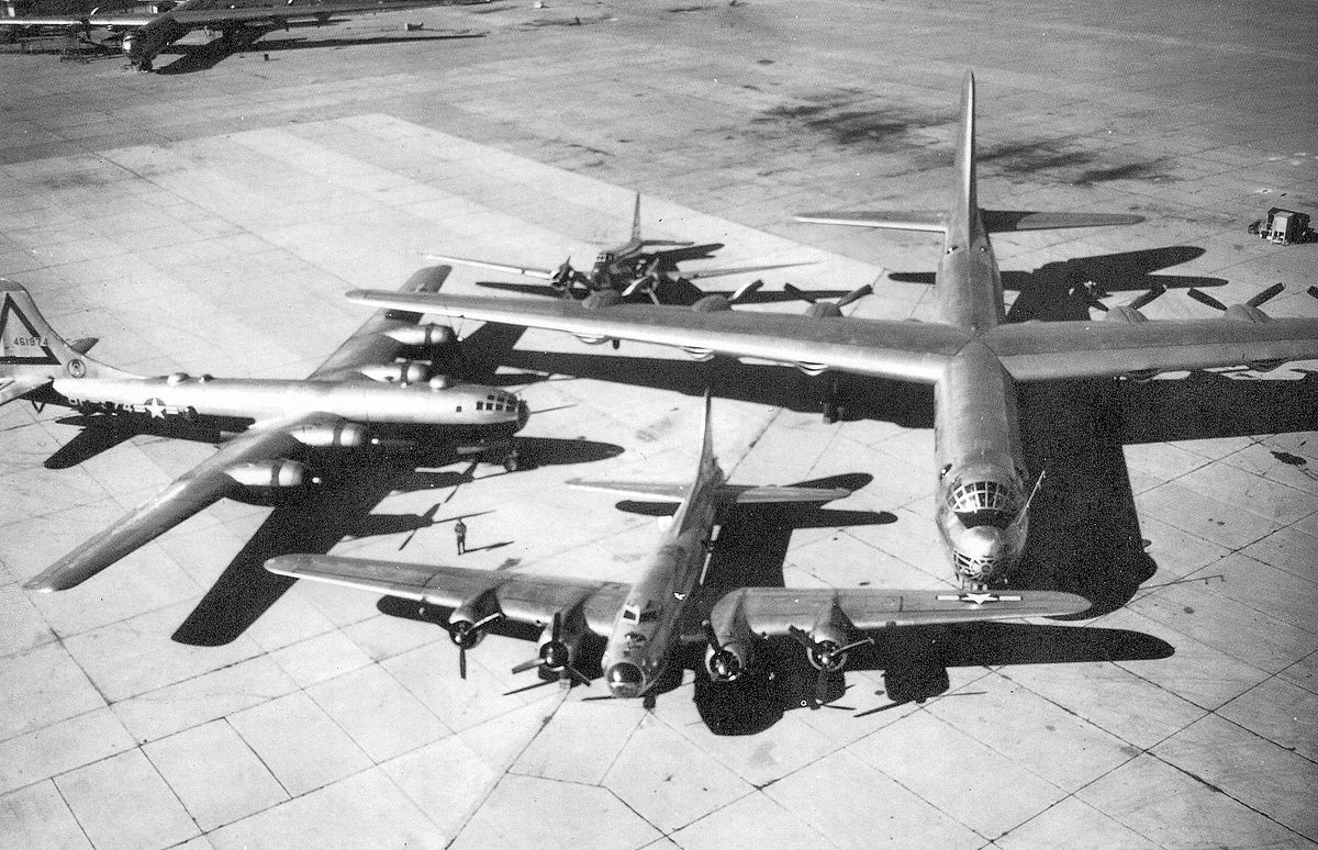 Special photo of Air Force bombers from the 1930s through the late 1940s. A Douglas B-18 "Bolo"; a Boeing B-17 "Flying Fortress"; a Boeing B-29 "Superfortress" and the B-36 "Peacemaker" dominating the group photo with a 230-foot wingspan. Taken at Carswell AFB (Ft. Worth) after the receipt of the first B-36 in 1948.